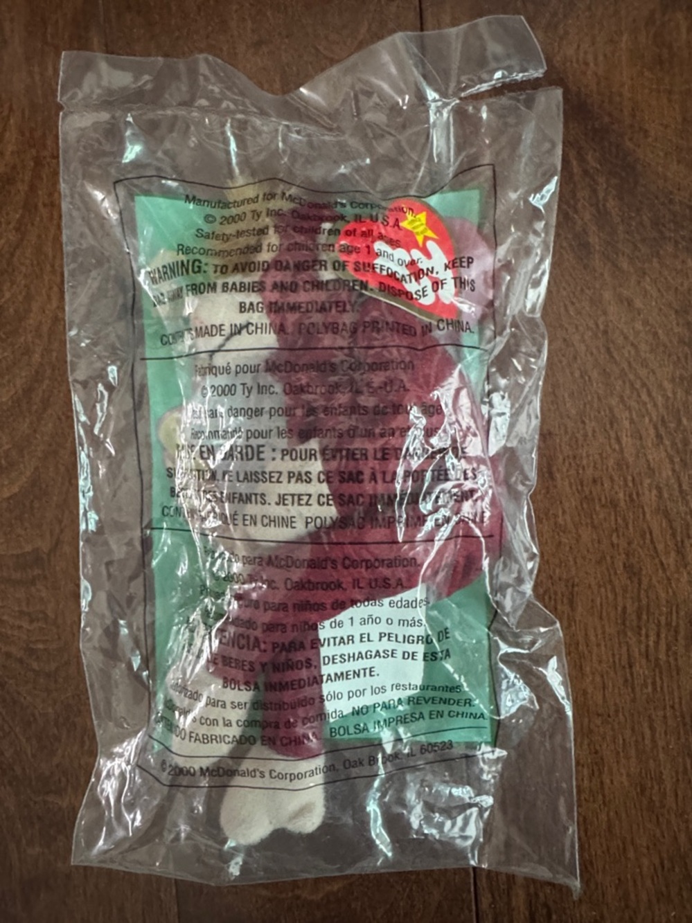 "Ty Teenie Beanie Baby" in original packaging. "Schweetheart" the Orangutan